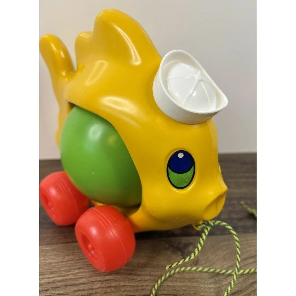 Vintage Pull Along Fish Toy Rolling Ball Rattle Plastic Sailor Hat